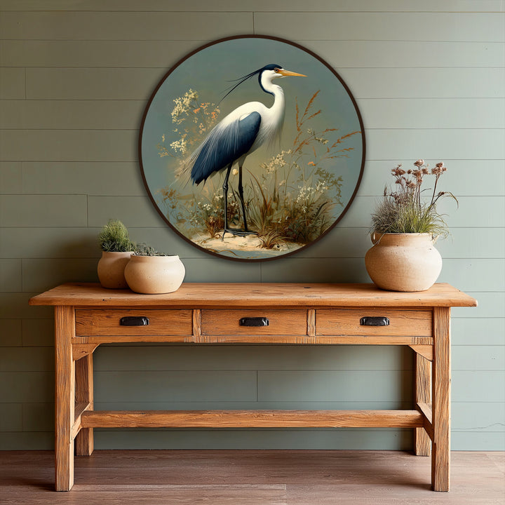 High color contrast highlights the elegant heron in this round, nature-themed modern oil painting art with sage tones and a handcrafted aesthetic.