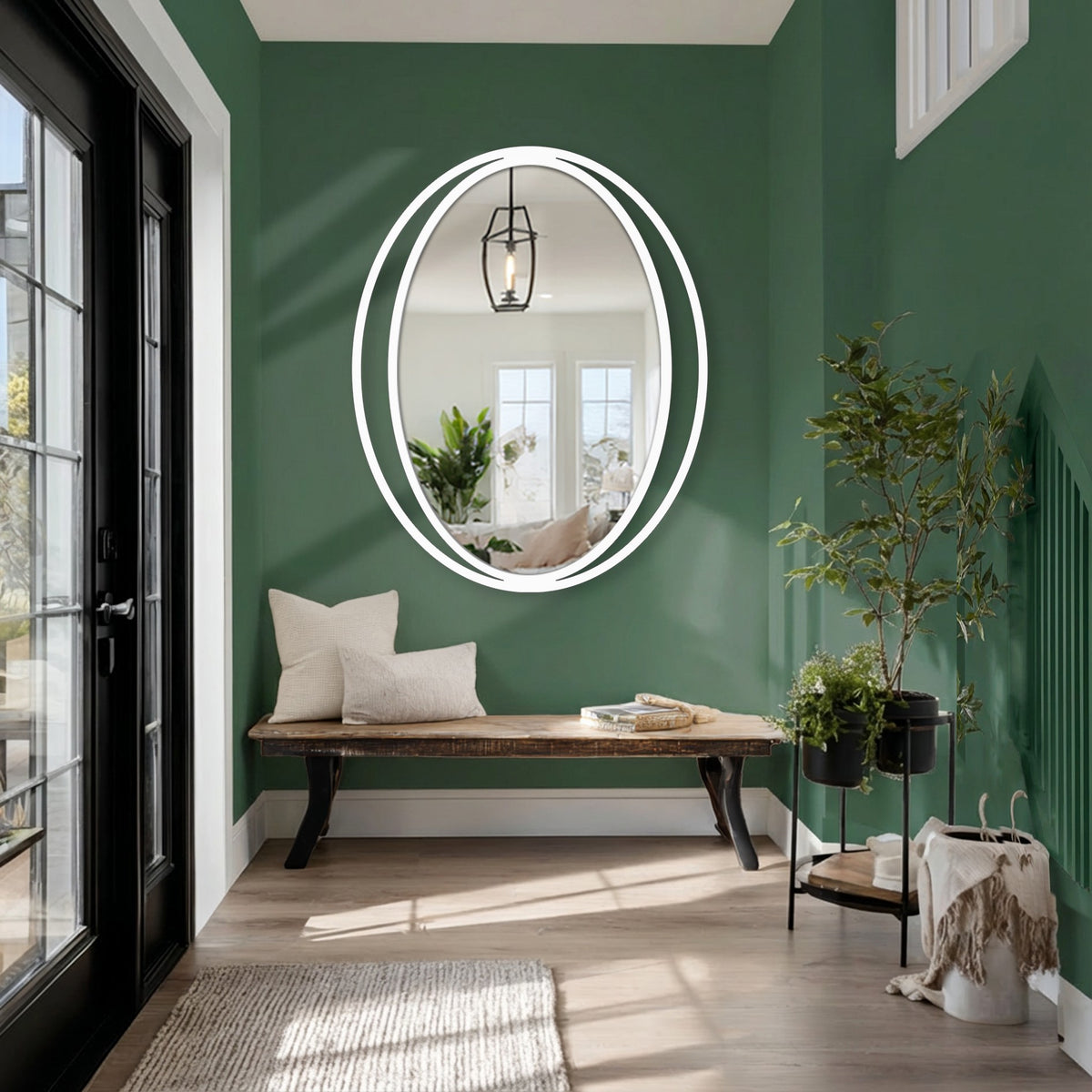 Sleek black framed oval mirror