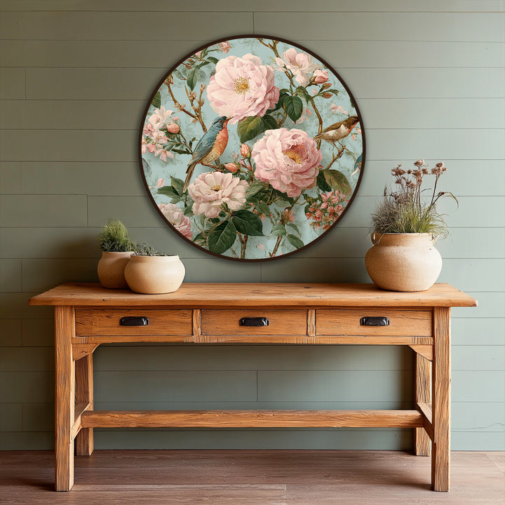Layering creates depth in this modern oil painting art, featuring a blossoming garden with songbirds depicted in a round floral arrangement.