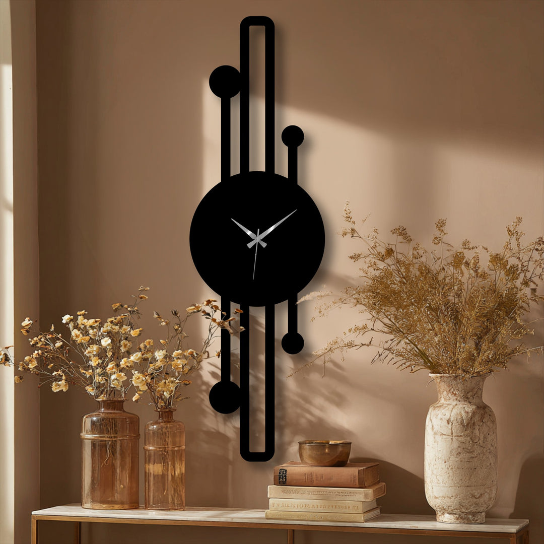 Smooth surface texture contrasts with the geometric lines on this vertical minimalist metal artwork clock, offering a modern home decor aesthetic.