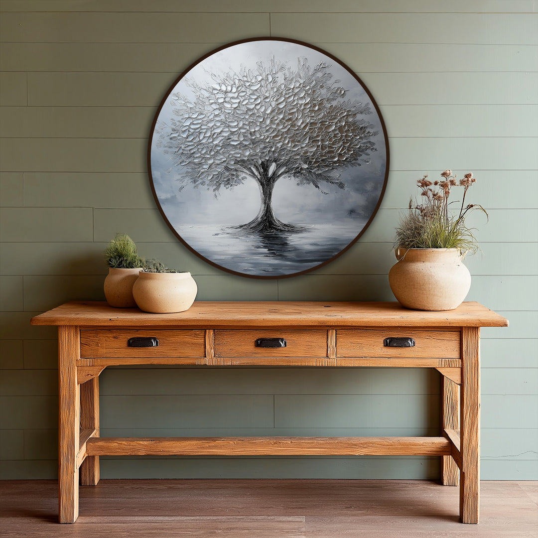 The impeccably textured, monochrome tree of life in this round oil painting art prints features heavily applied silver paint, casting elegant reflections.