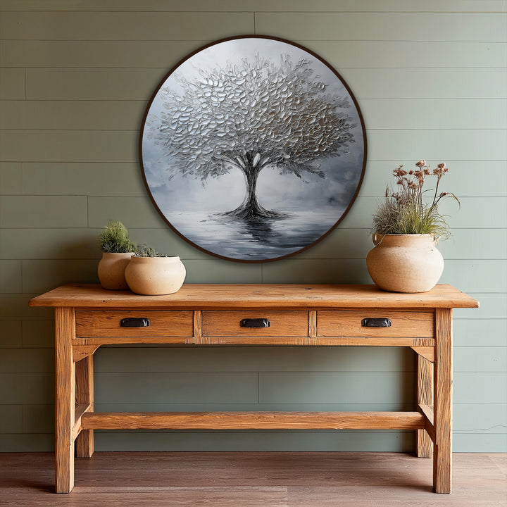 The impeccably textured, monochrome tree of life in this round oil painting art prints features heavily applied silver paint, casting elegant reflections.