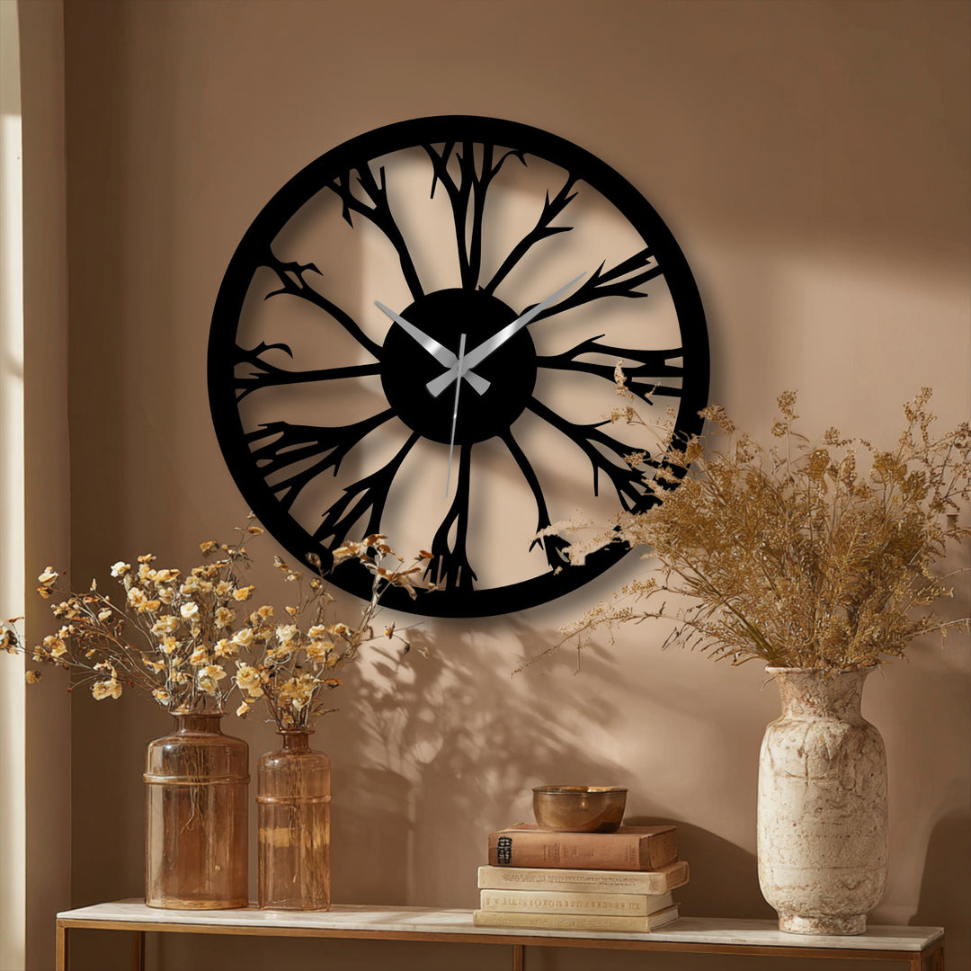 Defined by the darkest area, a tree silhouette nature metal wall clock features intricate branches, creating a unique metal wall decor piece.