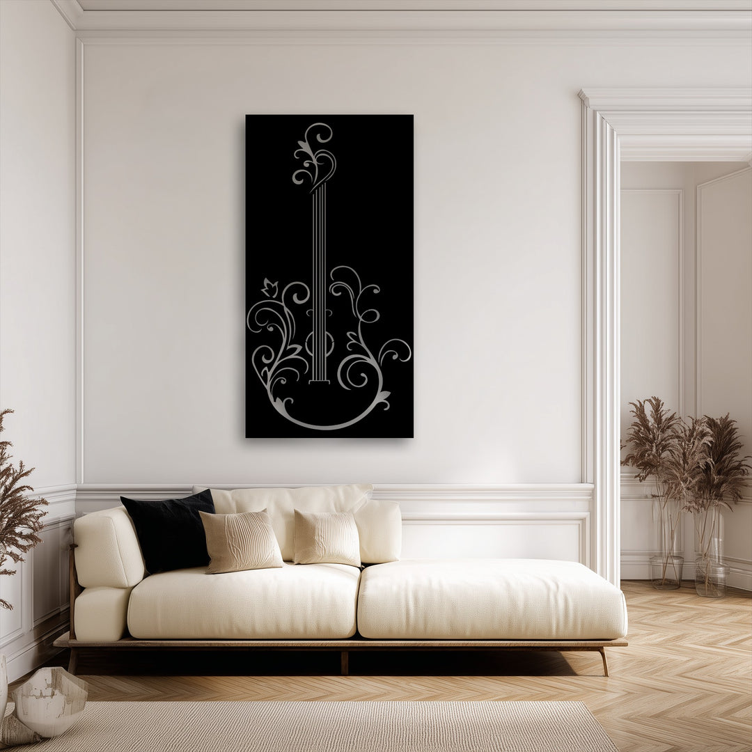 The striking black and silver elegant guitar silhouette, a unique metal wall art piece with intricate floral details, is the focal point of this room.