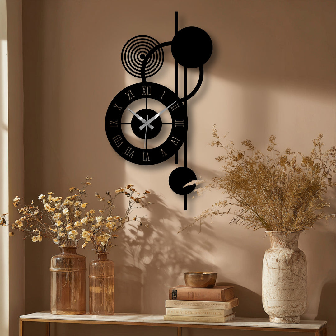 Textured surface of the modern orbit metal wall clock showcases the raised numerals and subtle imperfections in the metal artwork, adding depth to the abstract design.
