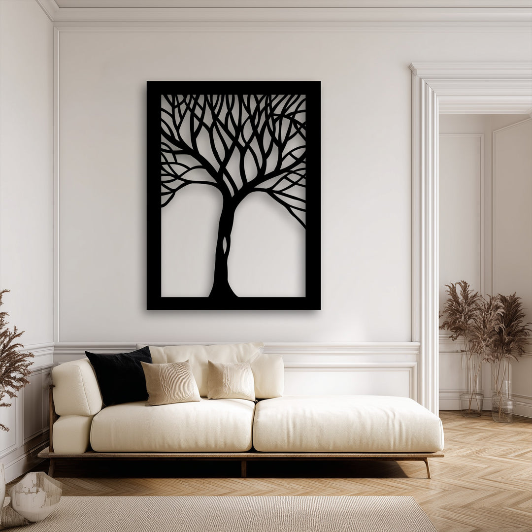 The abstract tree silhouette frame, a decorative metal art piece, achieves a distinct layering effect through its shadow, adding depth to the room.