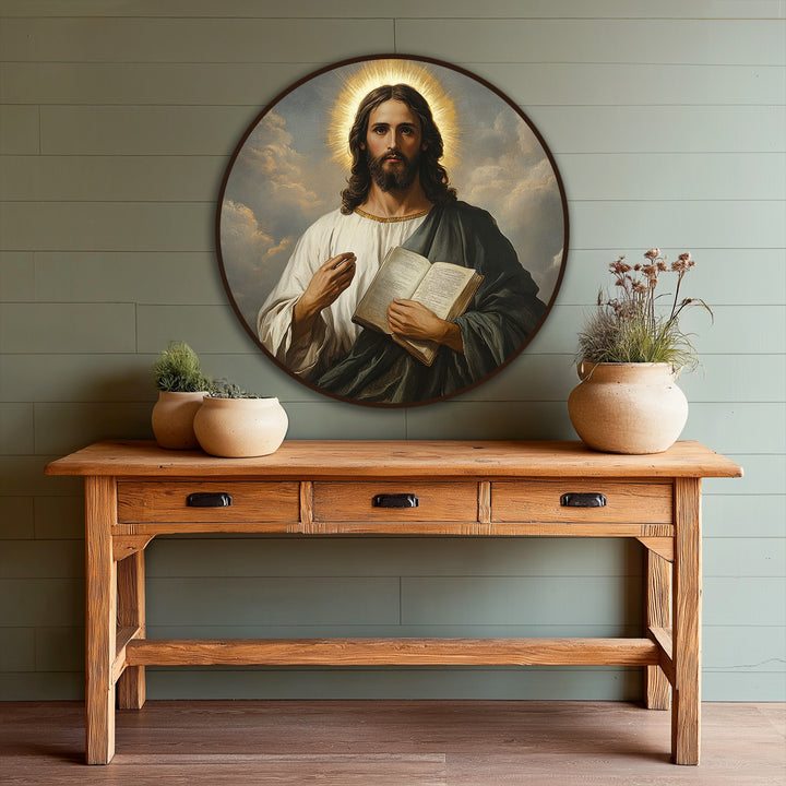 Defined shadows enhance the sacred light in this round portrait, a stunning example of oil painting wall art depicting Christ holding a book.