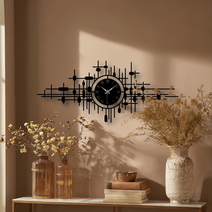 The rounded forms and abstract grid of the modern metal art for wall clock contrast with the organic shapes of the surrounding decorative floral arrangement.