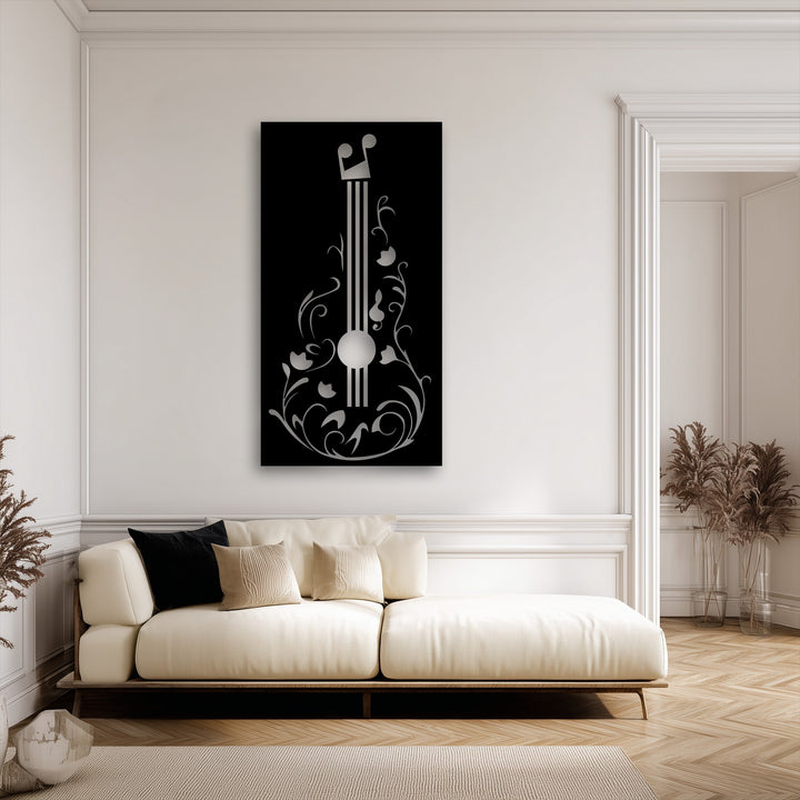 Commanding attention, an elegant black and silver floral guitar unique metal wall art piece brightens a neutral contemporary living space.
