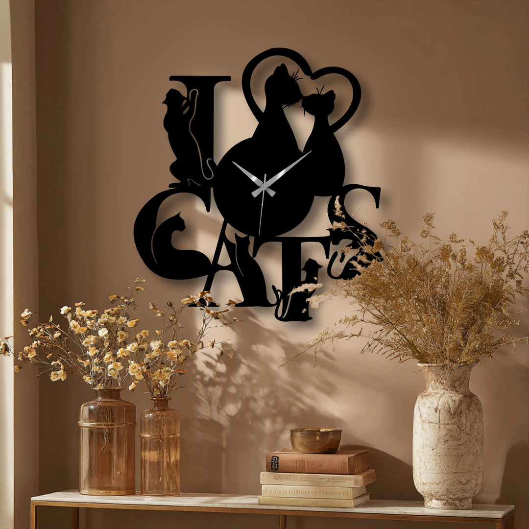 The abstract design of this Love Cats metal artwork clock skillfully uses silhouetted felines to convey romance.