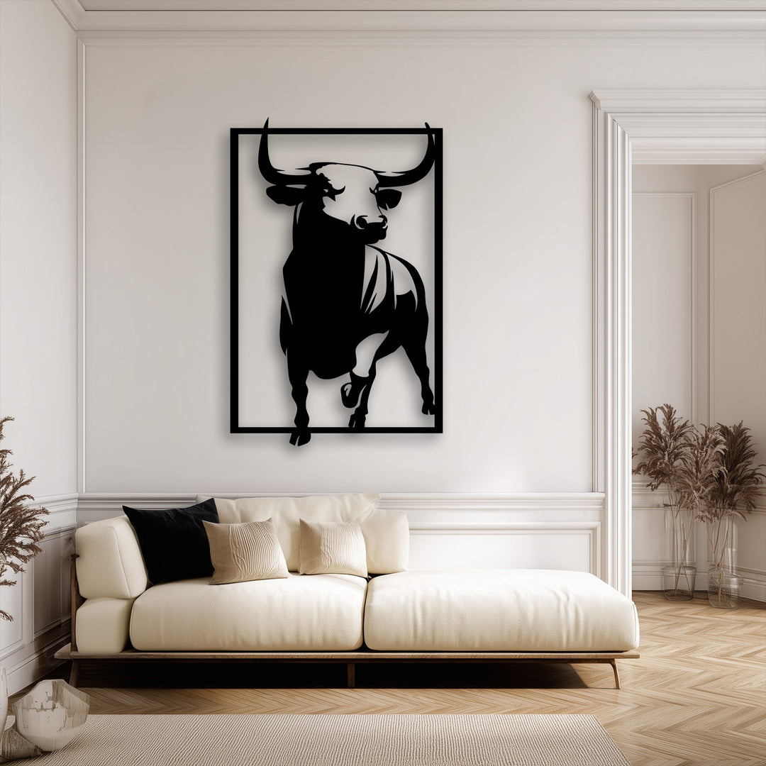 A textured, light-colored rug on a herringbone floor in the foreground grounds the room featuring a striking bull decorative metal art.