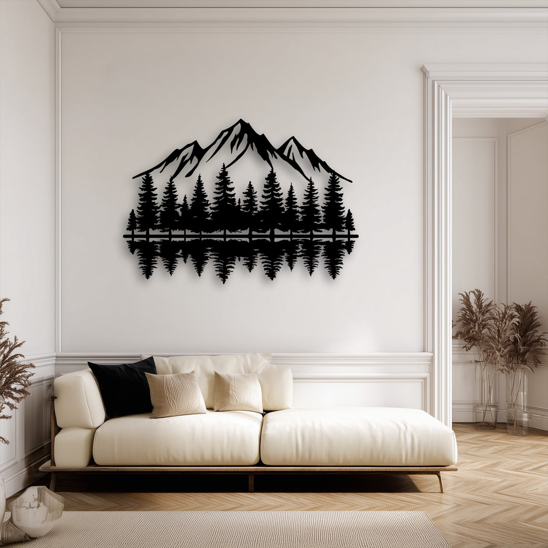 The inviting, warm color temperature of the room complements the black mountain forest reflection metal decoration wall art above a beige sofa.