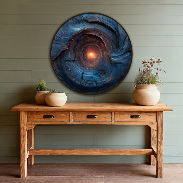 Light and shadow define the abstract blue spiral round oil painting reproduction print, where the core glows with luminous depth on the wooden canvas.