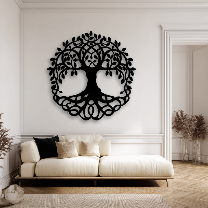 The pristine white wall, the brightest area, serves as a striking backdrop for the unique Celtic Tree of Life metal wall art.
