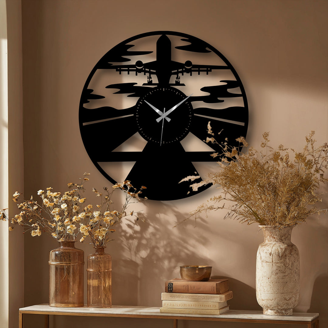The negative space in this unique aviation-inspired airplane silhouette metal artwork wall clock masterfully depicts a plane taking off above clouds.