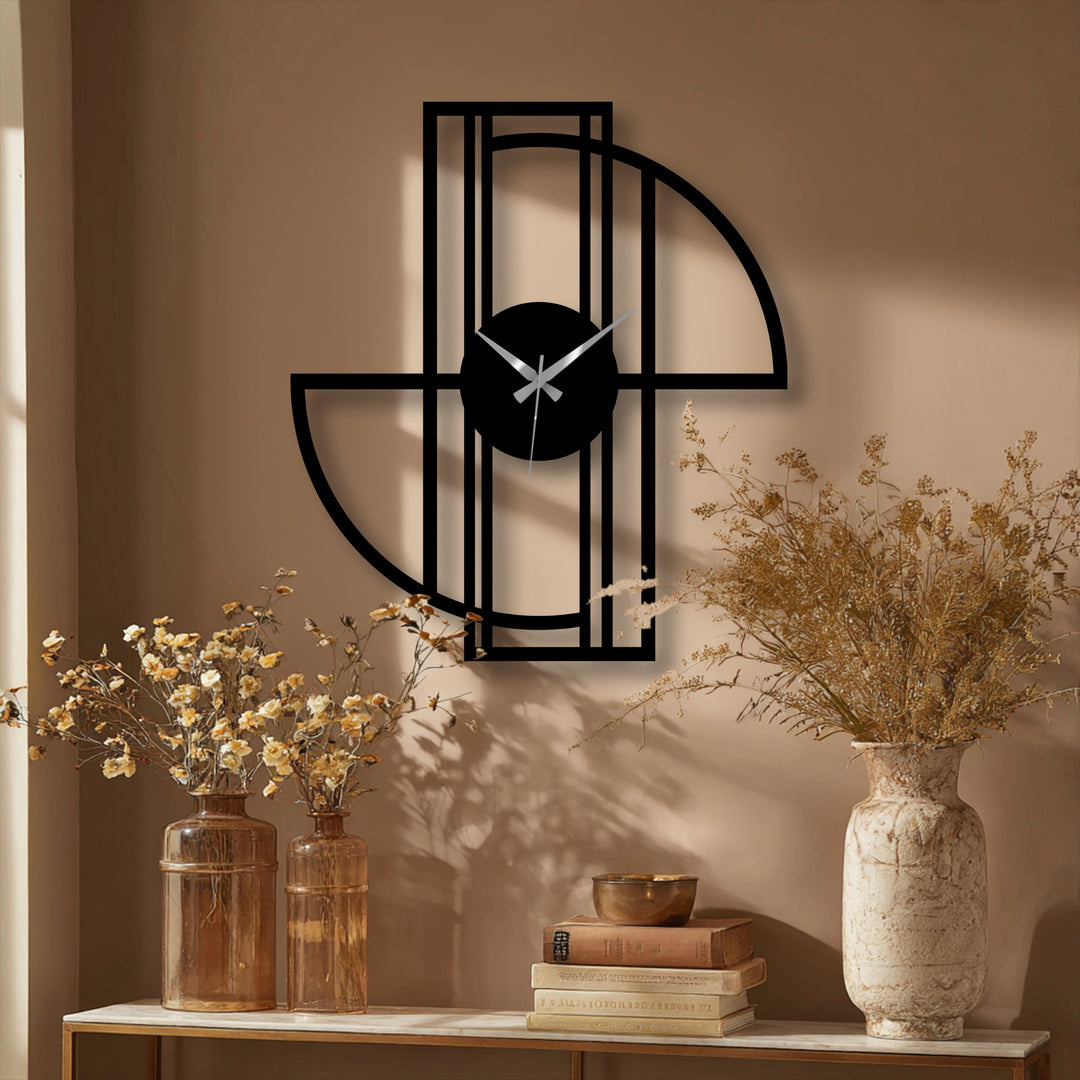 Juxtaposing organic forms of dried floral arrangements with the geometric frame metal wall clock accentuates its decoration wall art appeal.