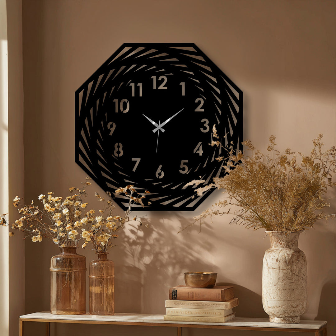 Textured metal shows a matte surface texture on this modern, spiral geometric metal wall clock, creating a distinctive, unique metal wall art piece.