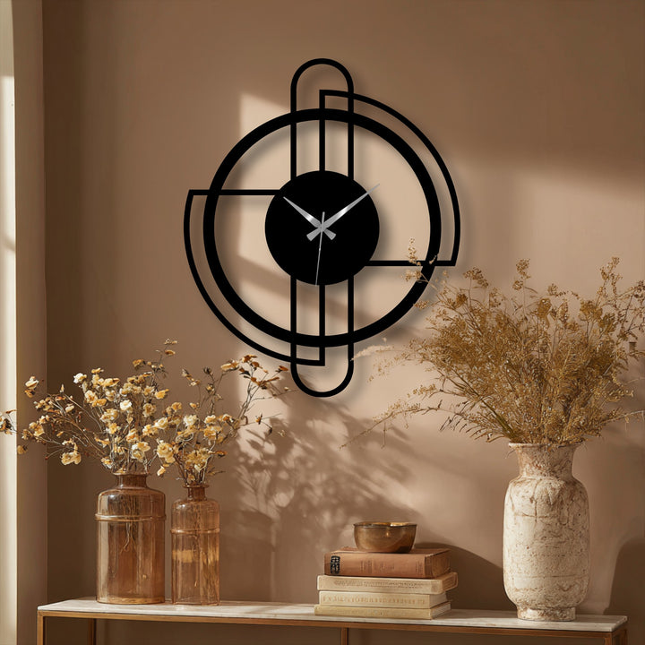 The sleek edge of this modern circle frame metal wall clock showcases its minimal line design as decoration wall art, bordering the black face and adding an artistic touch.