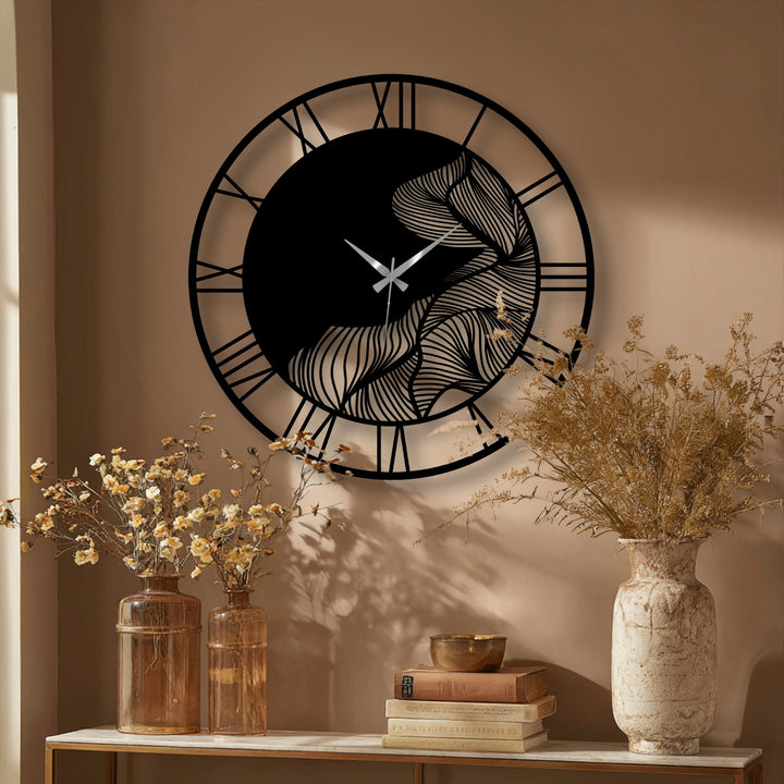 Horizontal, round abstract leaf metal wall clock showcases a botanical design and roman numerals, a unique metal wall art accent for modern spaces.