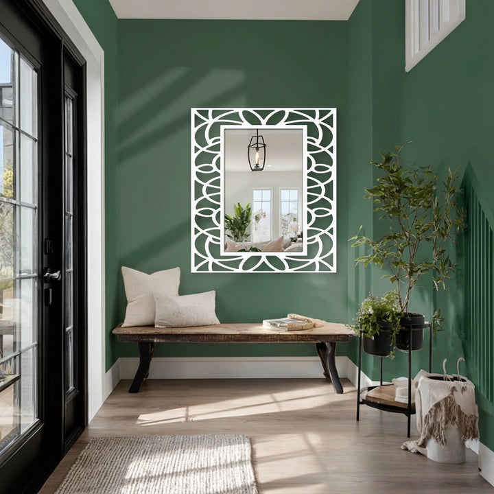 The symmetrical floral geometry frame modern bathroom mirror is the central subject, reflecting a bright room, positioned above a wooden bench, enhancing the room's decoration wall art.