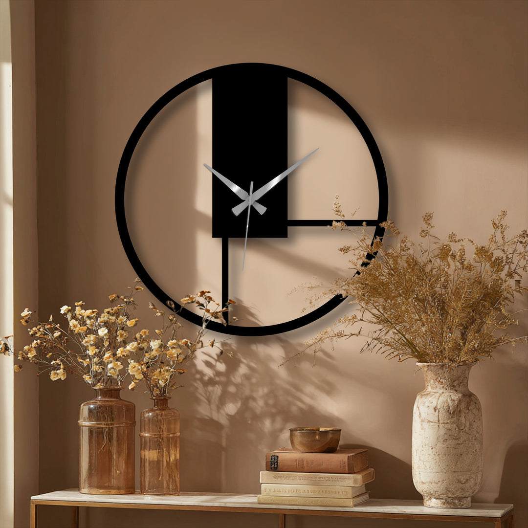 The darkest area of the minimal geometric panel metal wall clock features the sleek, modern metal artwork that makes this timepiece a stylish addition.