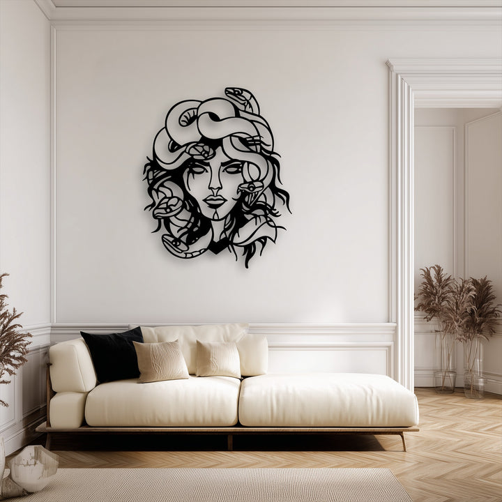 The dramatic and sophisticated mood of this modern living space is enhanced by the striking Medusa decorative metal art.