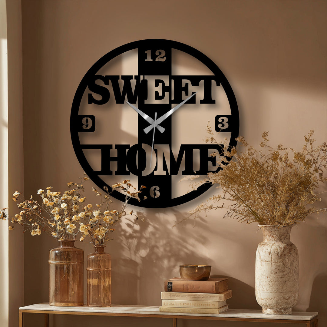 Crafted from durable metal, this sweet home metal wall clock shows the high material quality and adds artistic flair with its metal art for wall appeal.