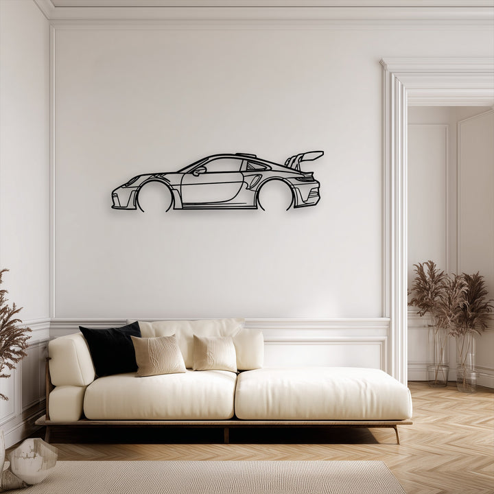 High color contrast defines this metal sport car outline decoration wall art against the light wall, creating a striking minimalist automotive decor piece.