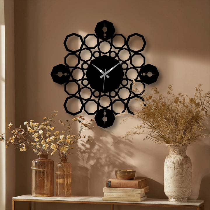 A subtle color transition on the warm wall enhances the geometric mandala metal wall clock, contemporary decoration wall art.