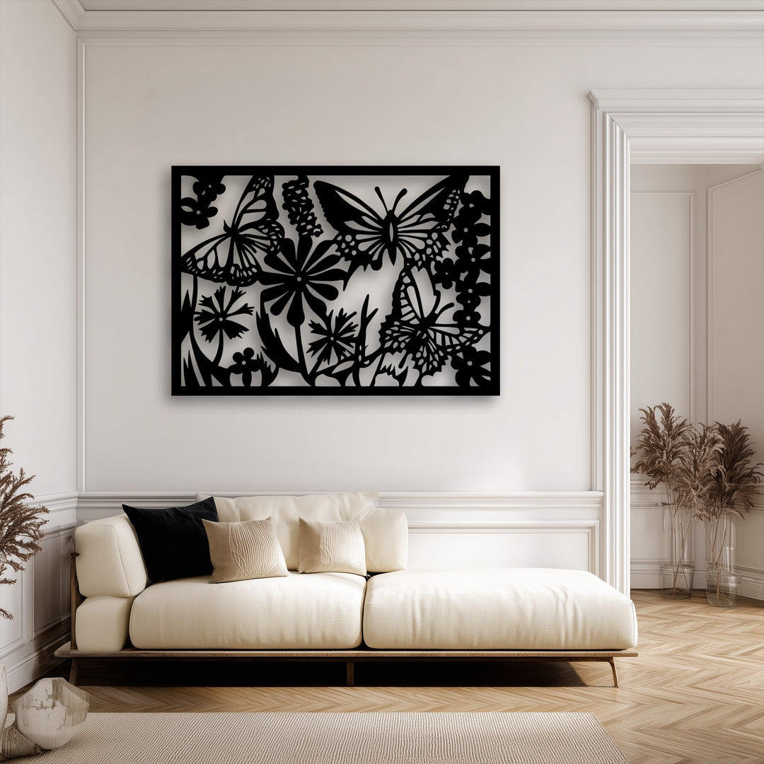An invitingly warm color temperature bathes the room, highlighting the unique metal wall art panel of a butterfly garden silhouette.