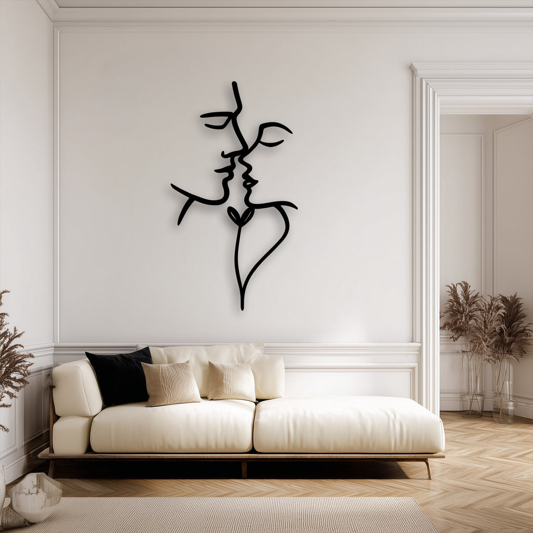 Soft light and subtle shadows outline the abstract face metal wall art, adding depth and visual interest as a unique decoration wall art piece.