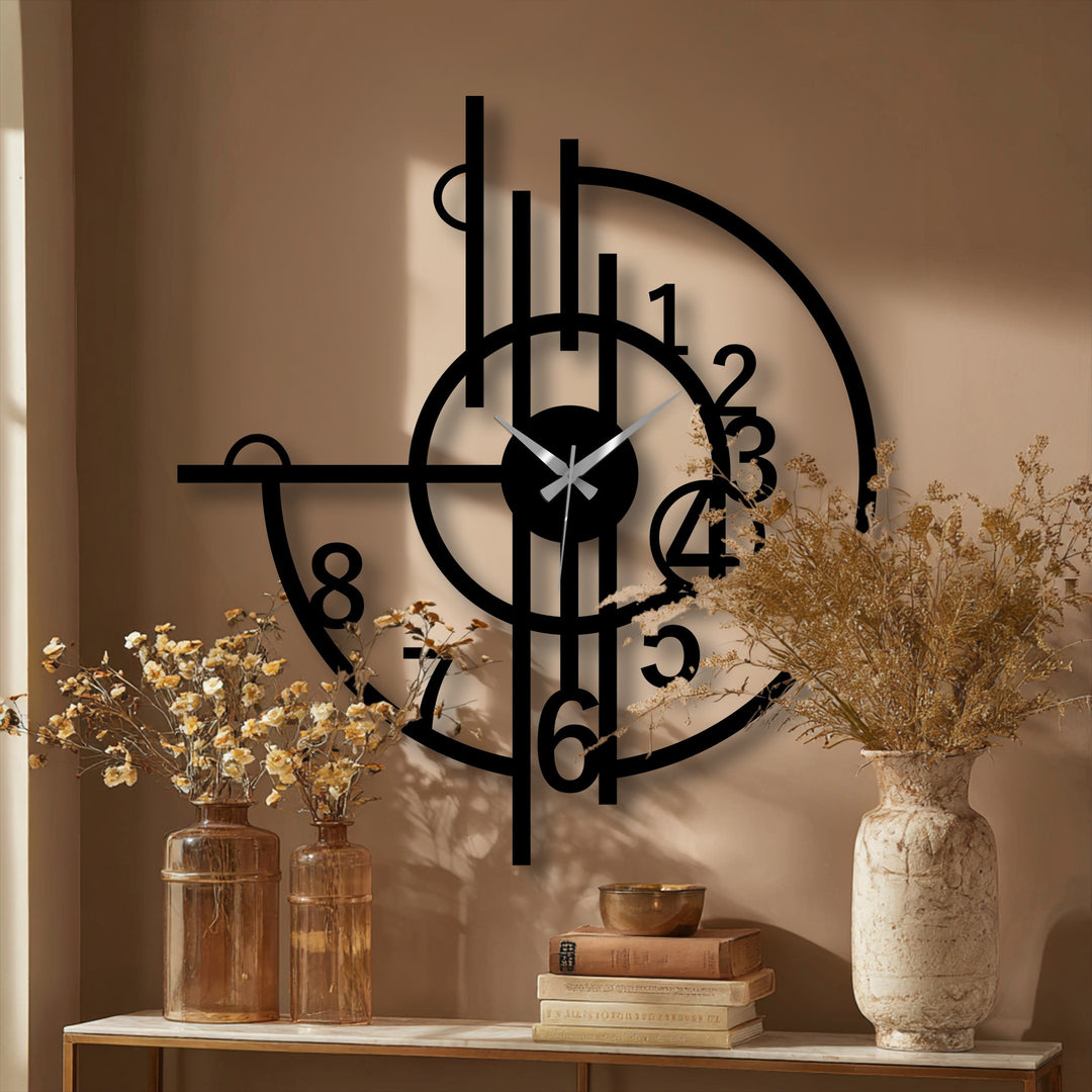 Soft, muted light enhances the abstract geometric design of this modern metal artwork clock, casting gentle shadows on the wall behind it.