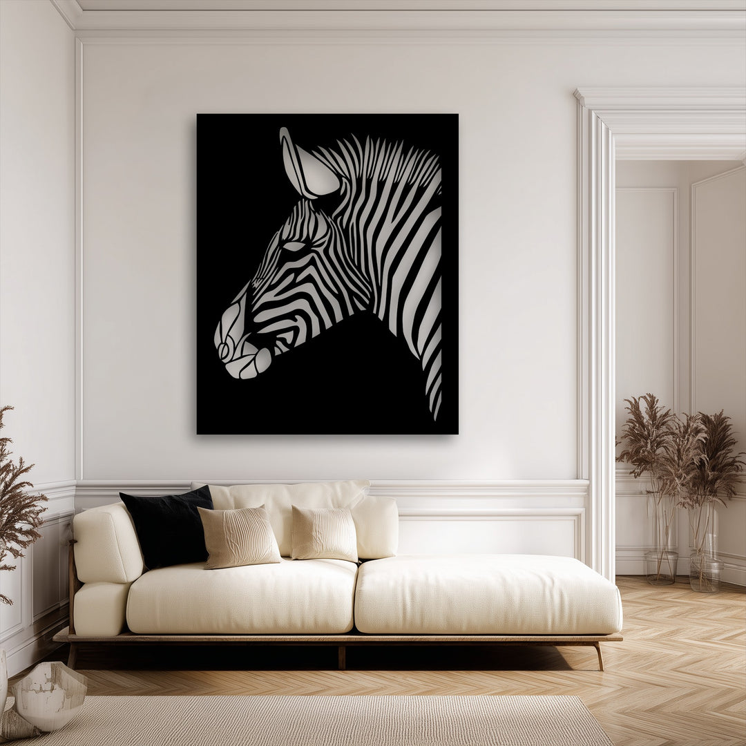 The brightest area reveals the shimmering white stripes of a stylized zebra metal decoration wall art piece against a dark background.