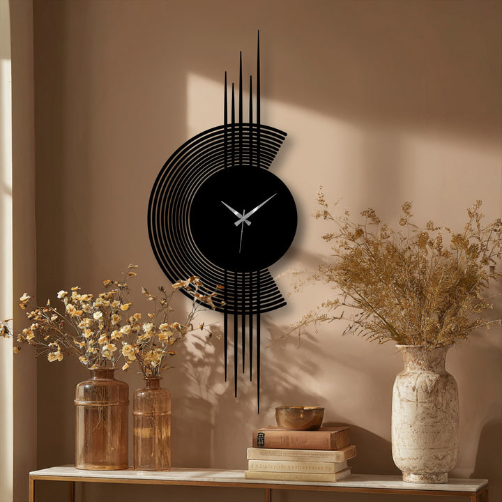 The stillness of the modern arc line metal wall clock's minimalist vertical design is captured in this stunning metal art for wall display.