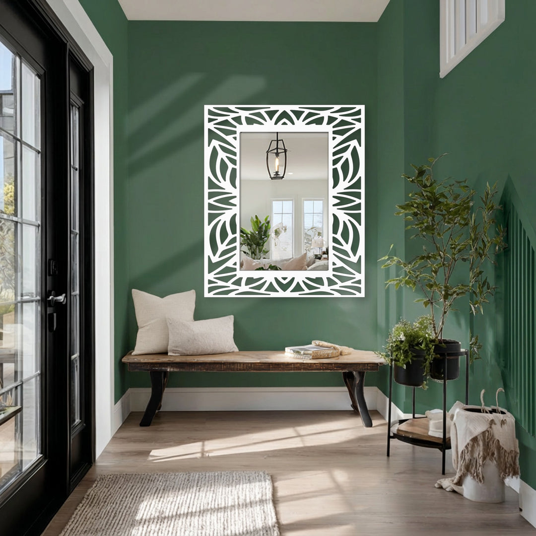 Deep green tones enhance the sleek, black metal wall decor of this tropical leaf silhouette frame floor mirror, adding depth to its modern design.