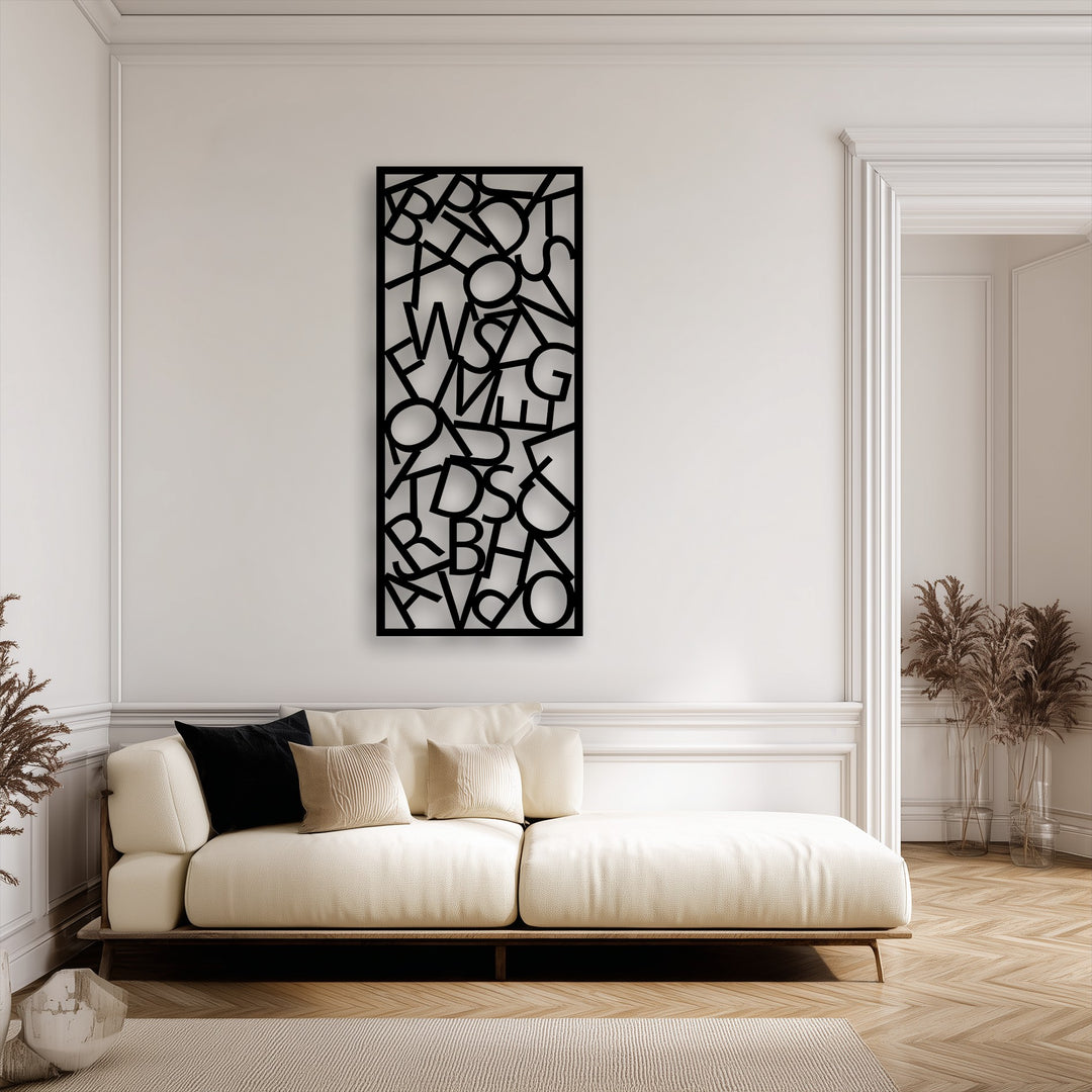 The abstract typography metal decoration wall art, a captivating focal point, features a dynamic composition of scattered black letters on a light wall.