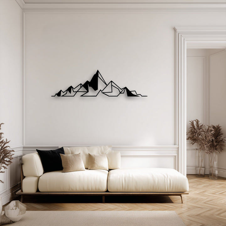 The muted color saturation of the room emphasizes the sleek Abstract Mountain Line metal decoration wall art, contrasting with the soft, neutral furnishings.