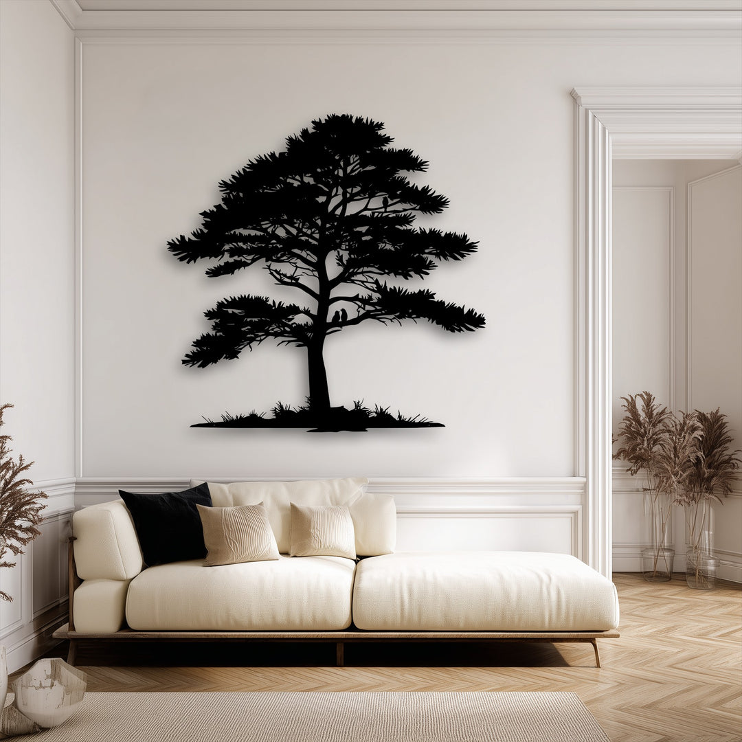 The negative space of the bright wall strikingly emphasizes the intricate black pine tree silhouette, a sophisticated piece of metal artwork.