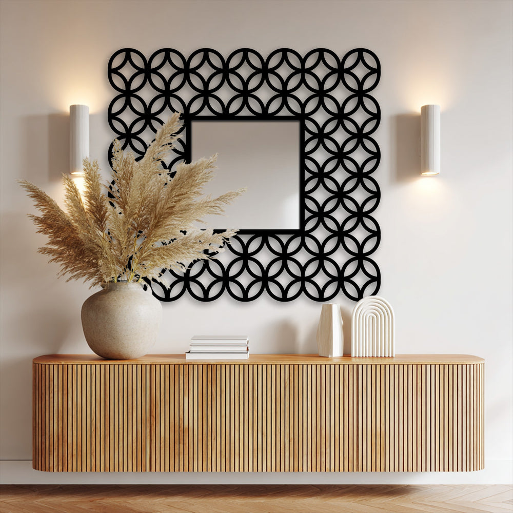 Showcasing the depth and layers, a square framed wall mirror features an interlocking ring pattern for modern home decoration, adding dimension to any space.