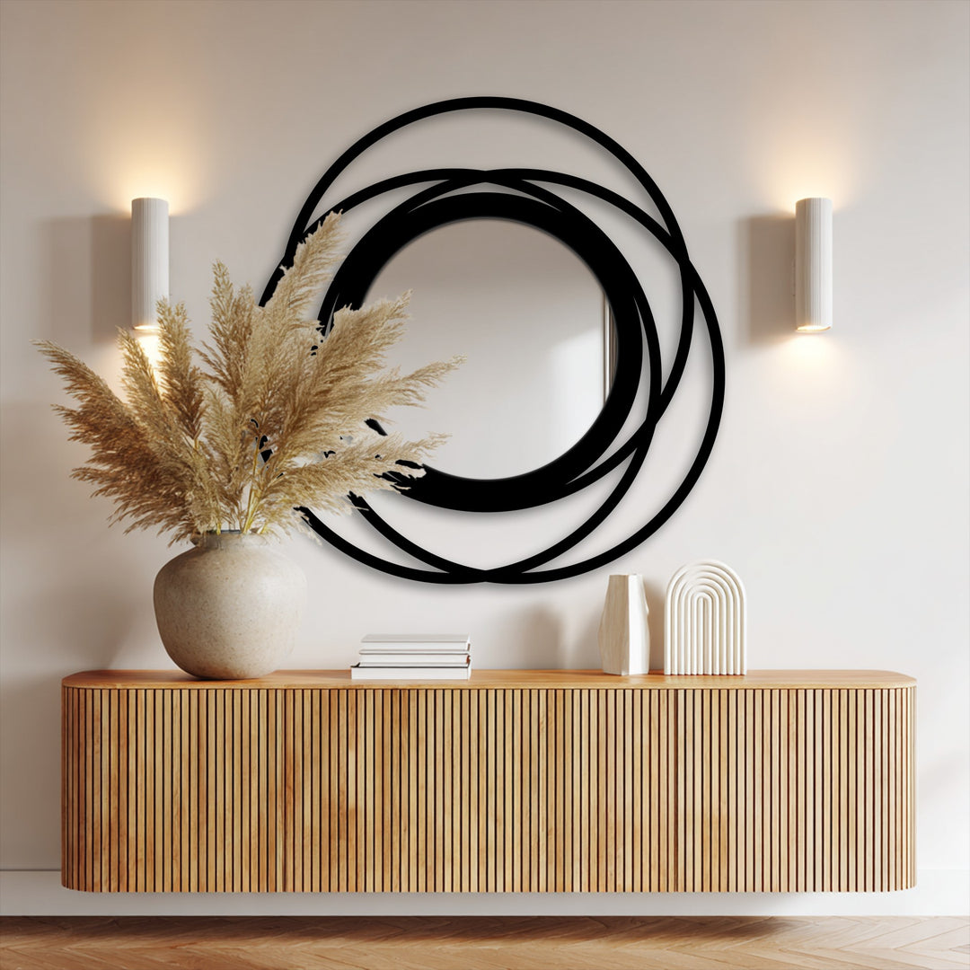 Highlighting depth and layers, the intertwined rings of this black metal floor mirror create a striking modern decorative metal art piece with a captivating dimension.
