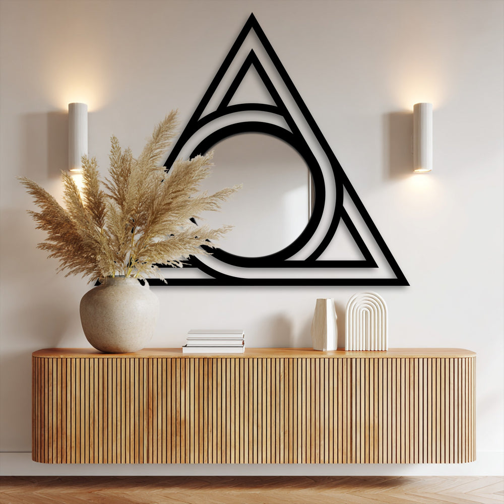 Minimal color saturation highlights the bold, black metal geometric frame of the Trinity Axis floor mirror, offering a striking decoration wall art piece.
