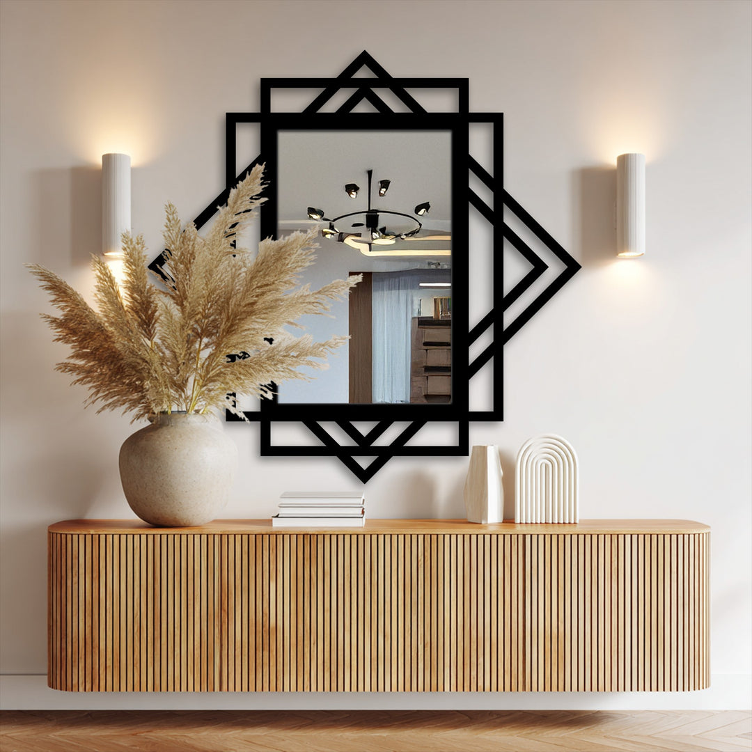 Featuring a matte black metal artwork finish, this geometric diamond layer wall art mirror showcases a modern, architectural design perfect for adding depth.