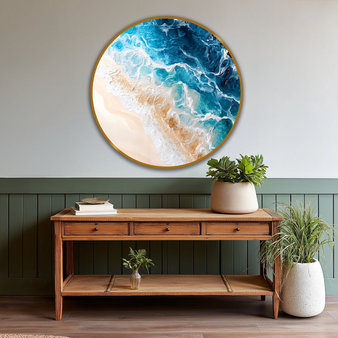 Textured brushstrokes enhance the finish of this coastal serenity round oil painting artwork, depicting turquoise ocean waves meeting a sandy beach.