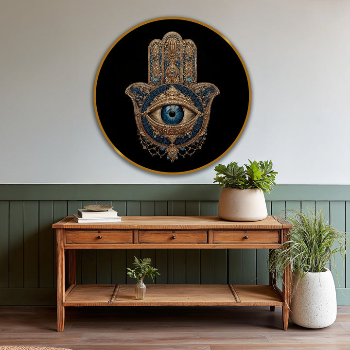 Warm color temperature radiates from this ornate hamsa eye symbol in our mystic oil painting wall art, contrasting the cool blue eye and the artwork's dark background.