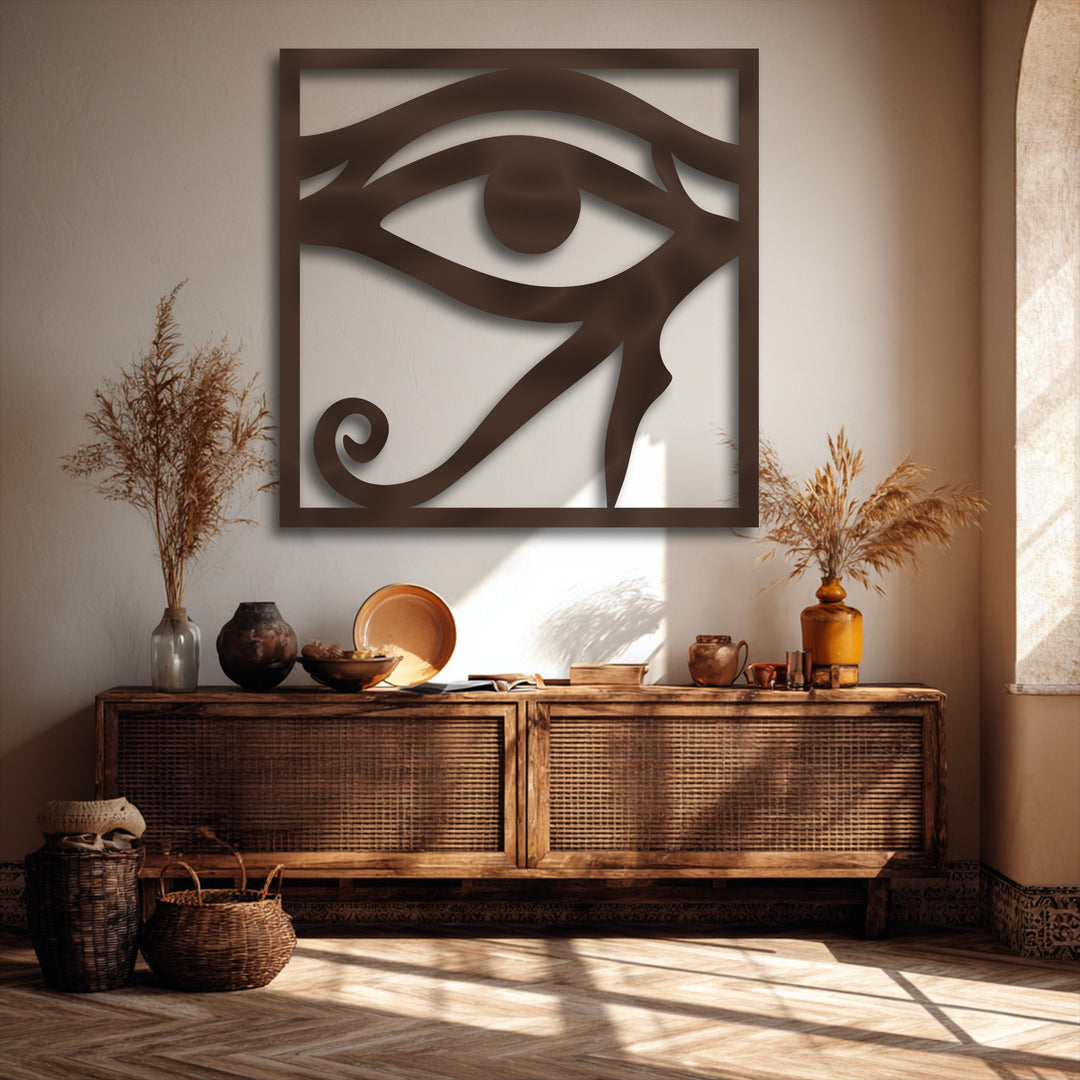 Its rich, dark bronze finish beautifully defines this unique metal wall art, casting a striking shadow for a dimensional Eye of Horus design.
