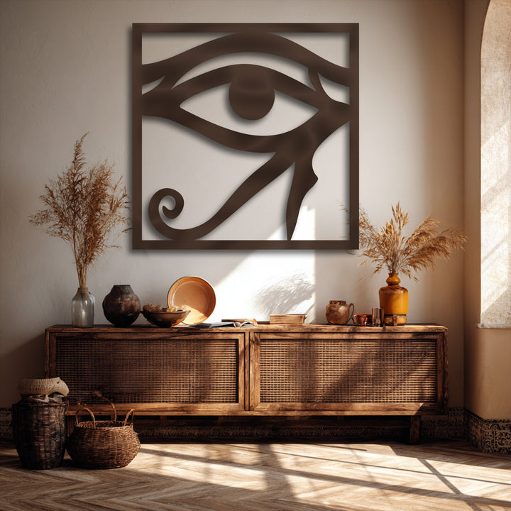 Its rich, dark bronze finish beautifully defines this unique metal wall art, casting a striking shadow for a dimensional Eye of Horus design.