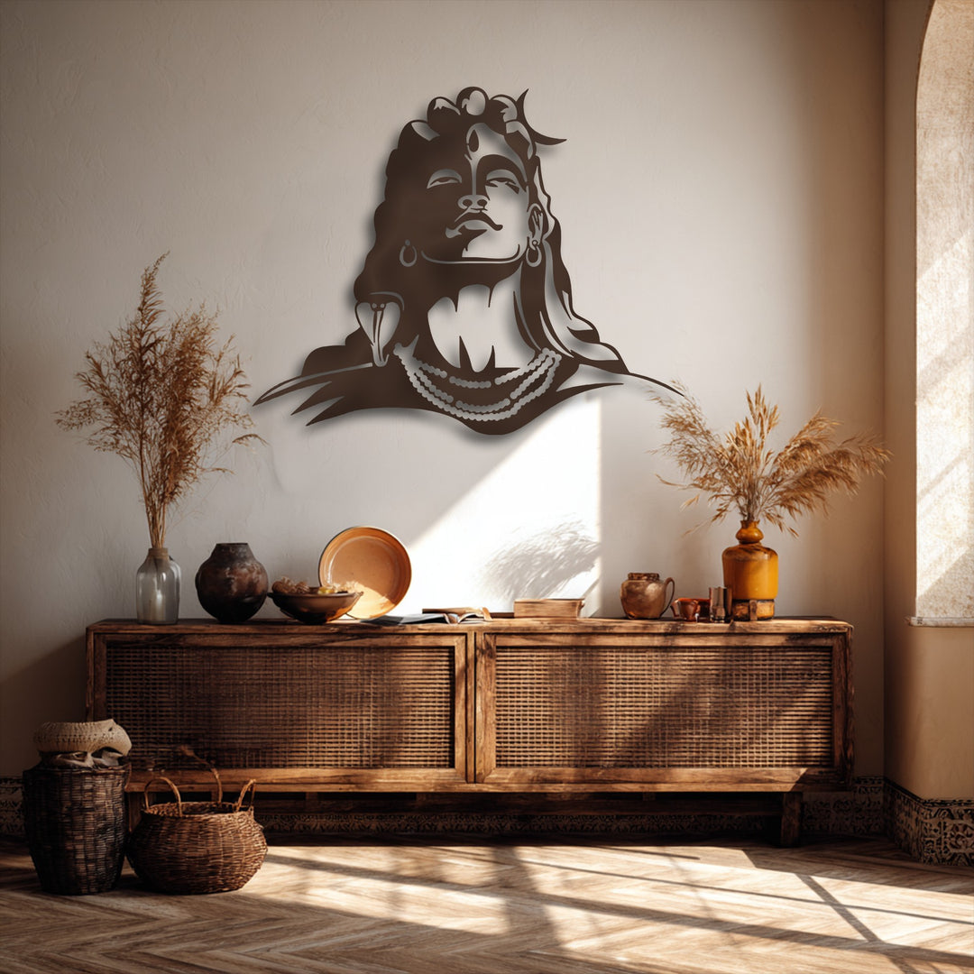 The realistic detail of the Lord Shiva metal artwork creates a profound spiritual silhouette against the textured wall, enhanced by natural sunlight.