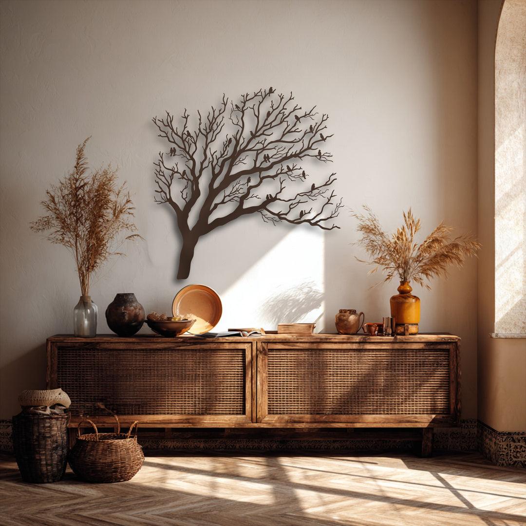 The visual rhythm of birds resting on the intricate bare branches of the nature silhouette decorative metal art flows across the wall.