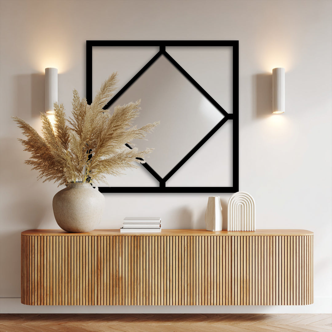 Highlighting the edge and borders, a geometric metal wall mirror features a diamond frame within a square, showcasing modern metal art for wall design.