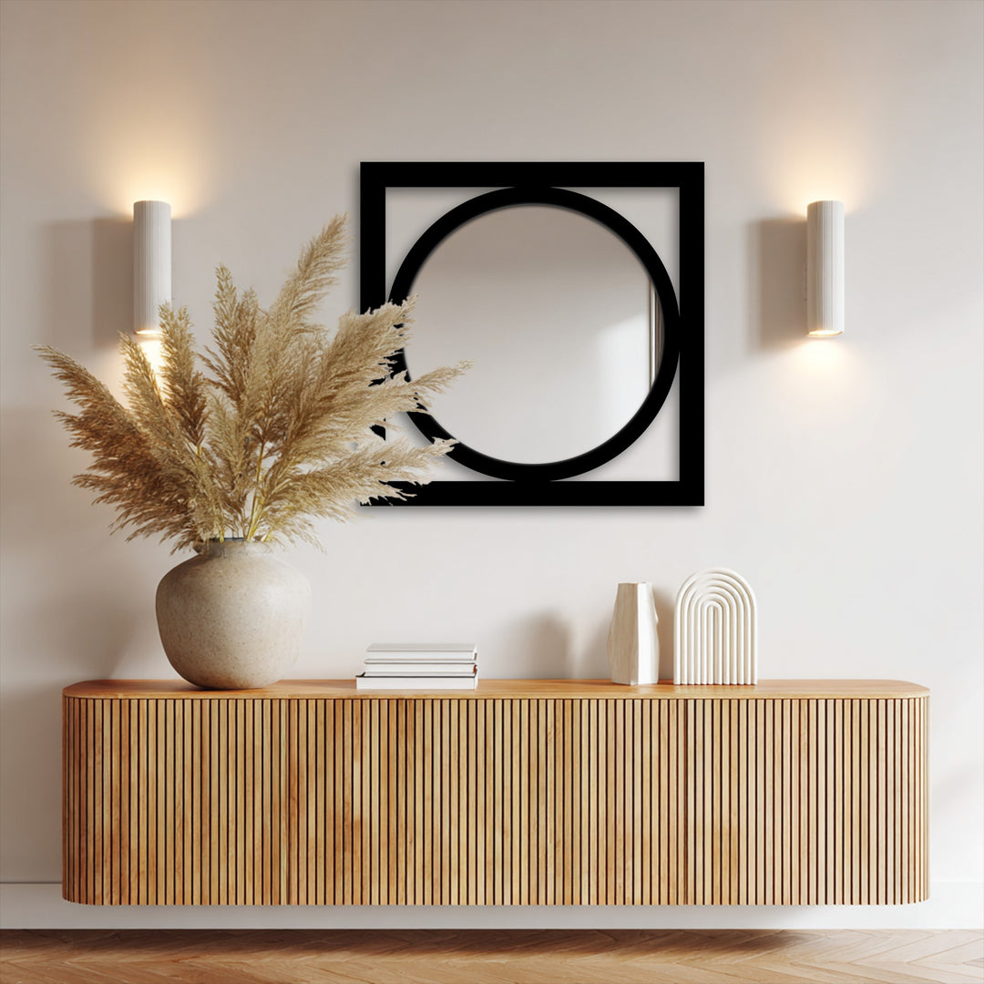 Low color saturation highlights the minimalist design of this circle within a square, decorative wall mirror, showcasing modern mirror style.